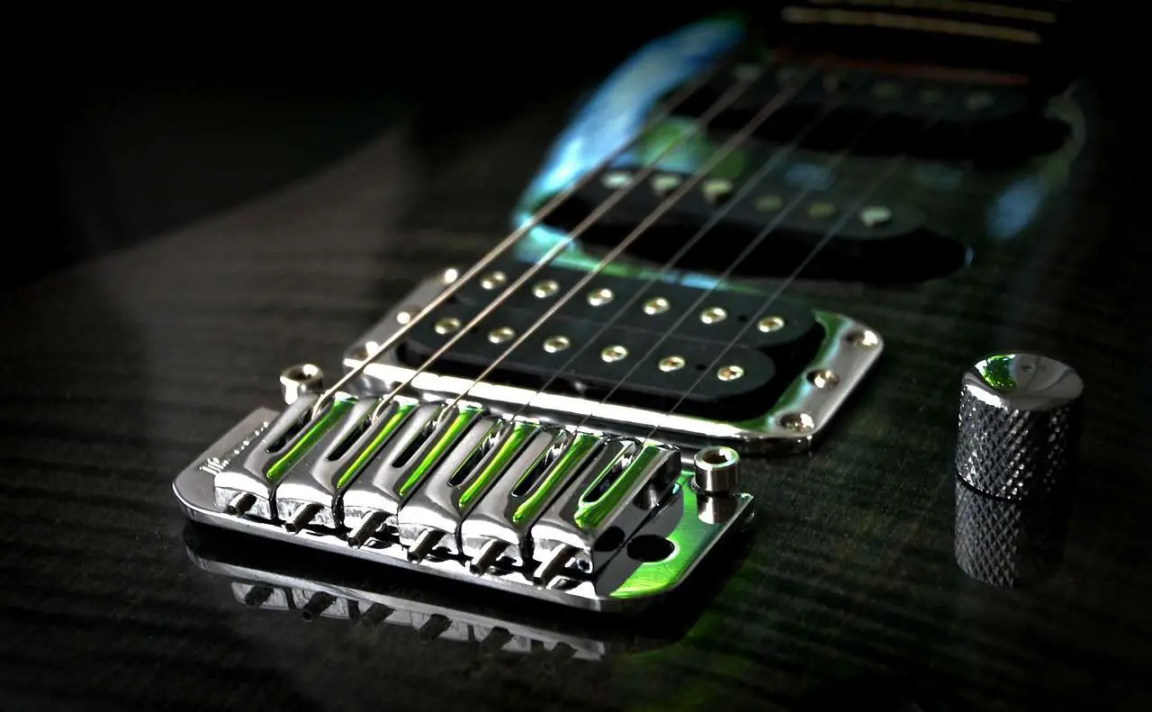 electric guitar with a shiny chrome bridge