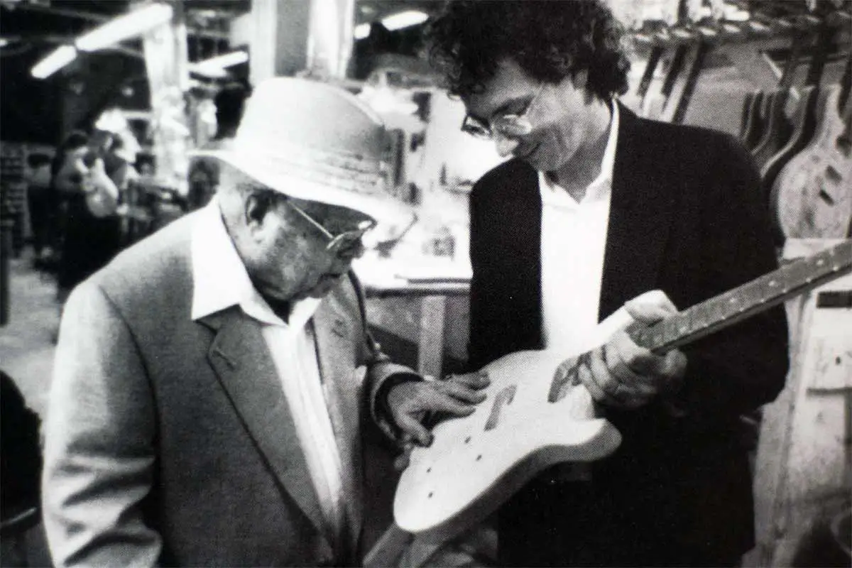 ted mccarty inspecting a guitar, kw first guitar, fender esquire, electric spanish