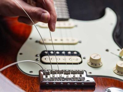 changing guitar strings on a fender strat