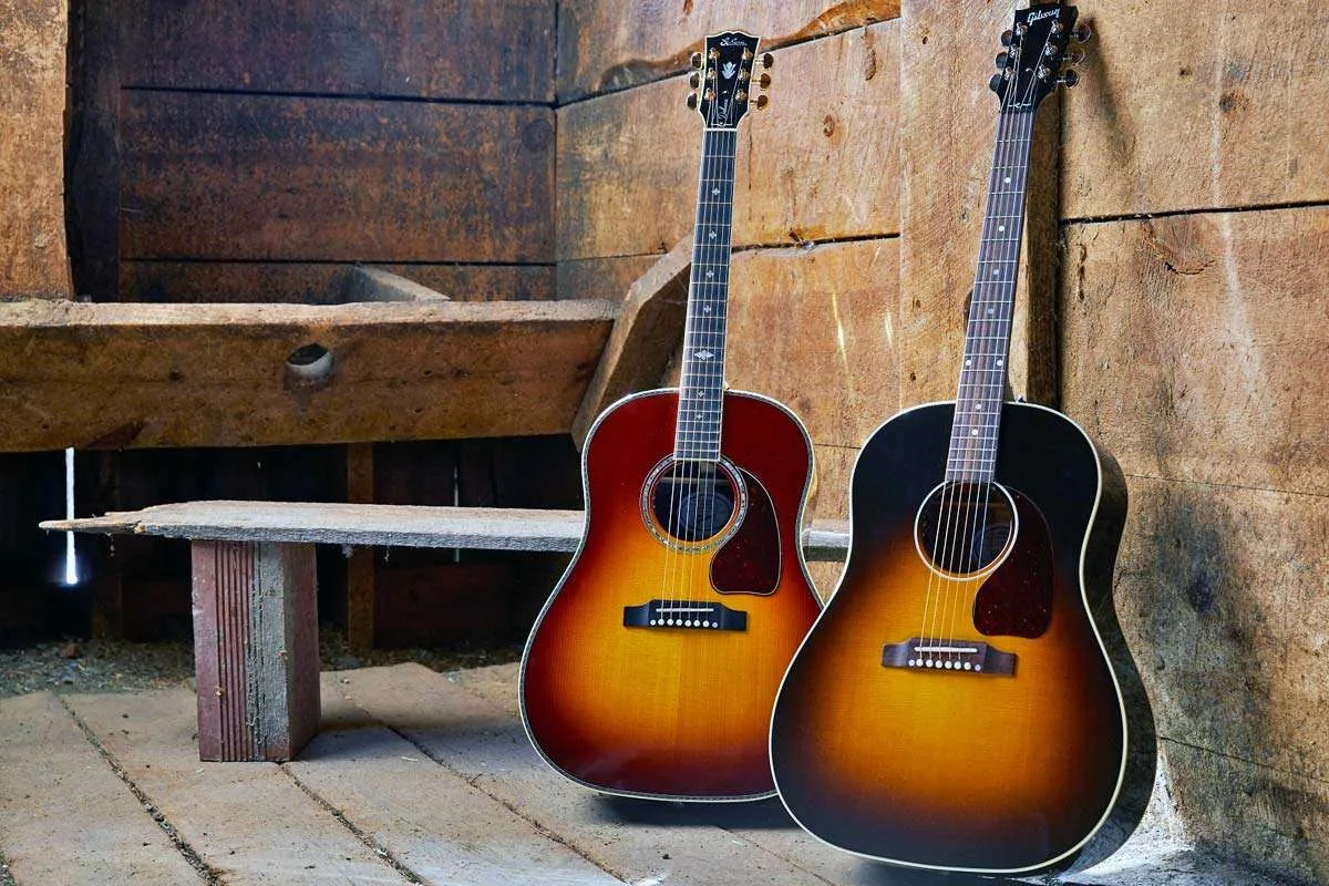 e major scale guitar, e scale on the guitar, notes in e major, 2 acoustic guitars against a wall, guitar scale e major