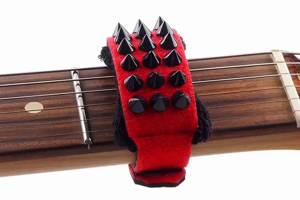 Fret wraps for unwanted string noise. adjustable strap lets you use them on acoustic guitars and extended range guitars