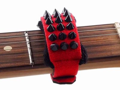 Fret wraps for unwanted string noise. adjustable strap lets you use them on acoustic guitars and extended range guitars