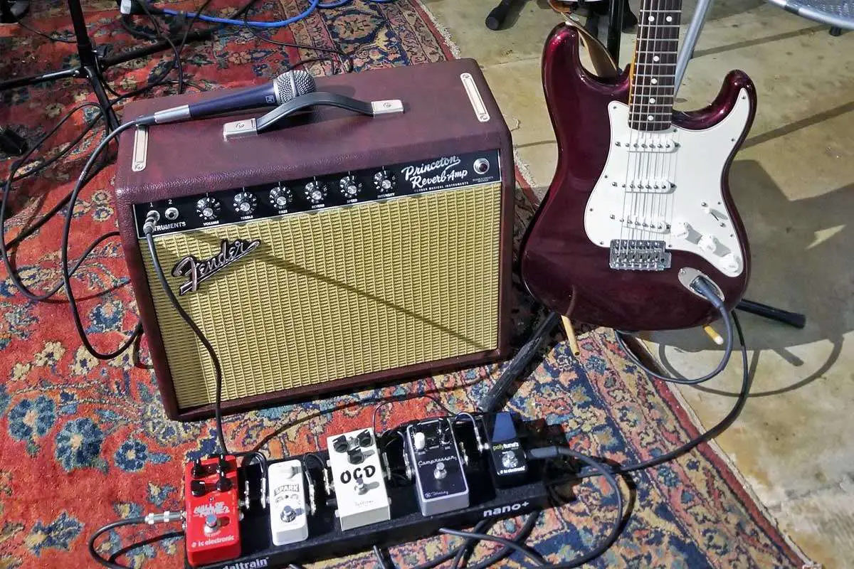 Practical Usage Scenarios - combo amp in a live setting with guitar and pedal board