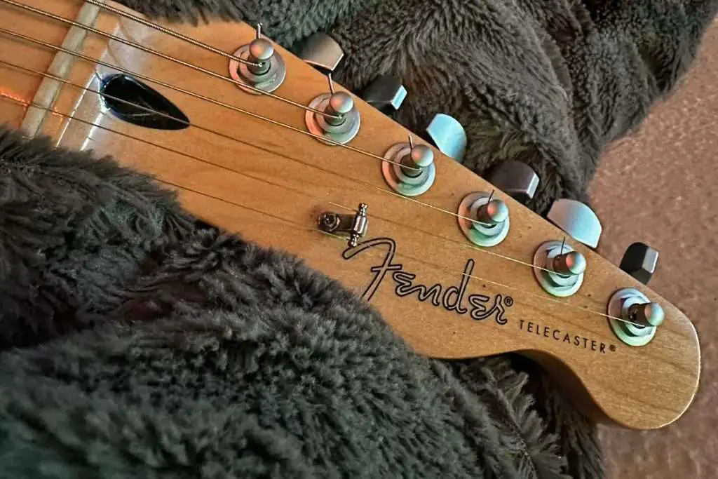 On Fender-style headstocks like those on Stratocasters and Telecasters, you'll find string trees that guide high strings