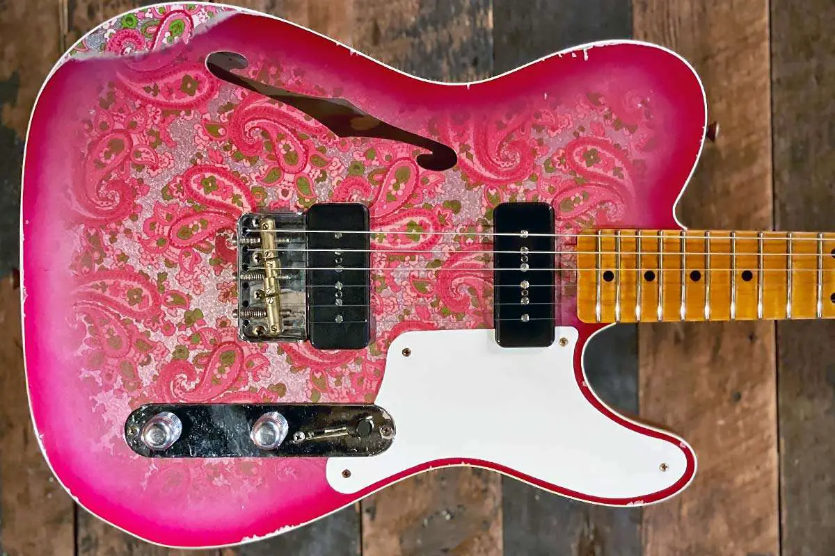 A custom paisley telecaster body with custom dimensions, showing unique contours and proportions