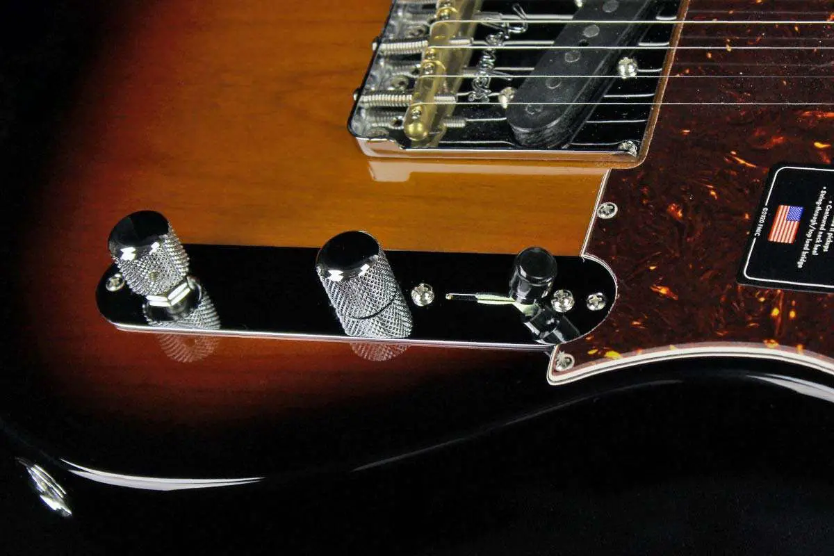 A telecaster body, 16 inches long and 12 inches wide, with a pickguard, control plate, and input jack on the front. Dimensions are crucial for an accurate illustration
